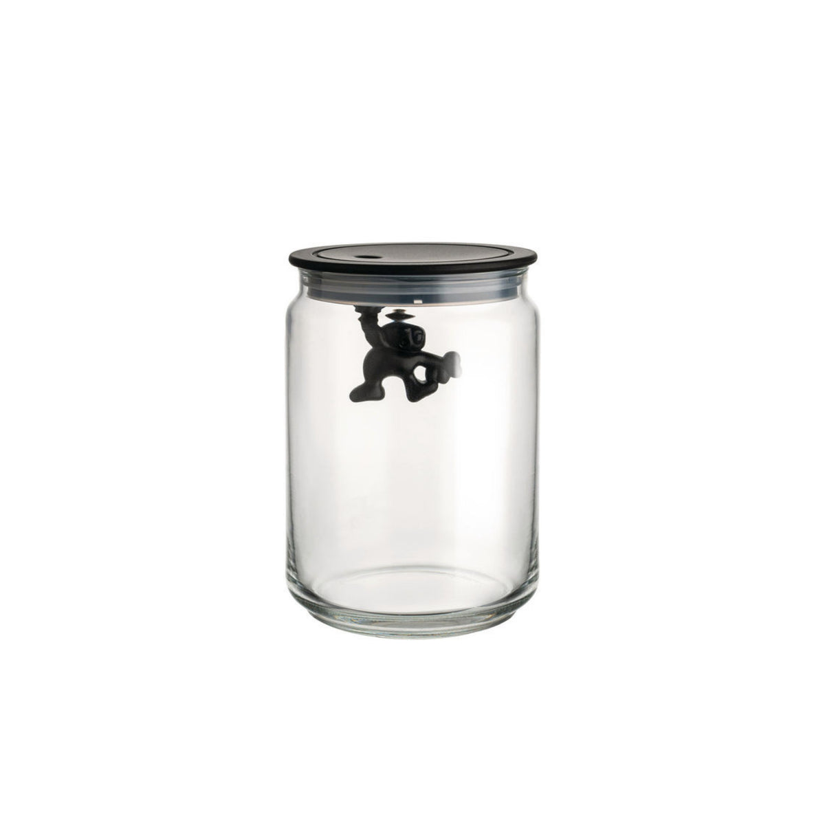 De Alessi Gianni Voorraadpot Zwart 90 cl van Alessi heeft een heldere pot met een zwart deksel, waar een klein zwart apenfiguurtje aan de onderkant hangt. De achtergrond is effen wit.