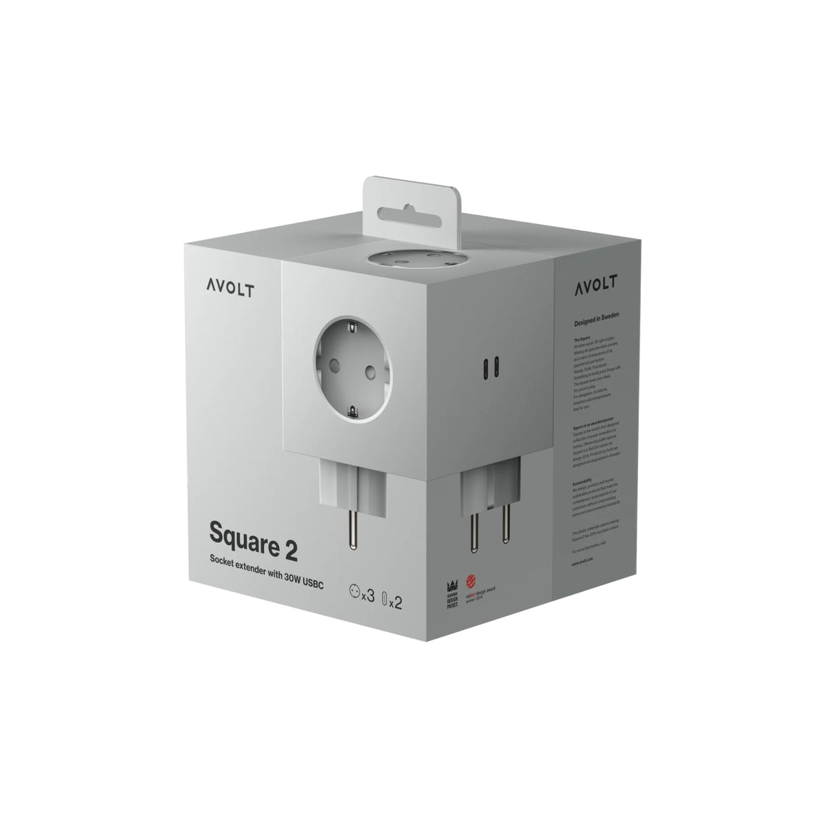 De Avolt Square 2 USB-C Stekkerdoos Gotland Grijs wordt getoond in zijn grijze verpakking, met productdetails en afbeeldingen van de witte stekkerdoos met 30W USB-C poorten op de voor- en zijkanten.