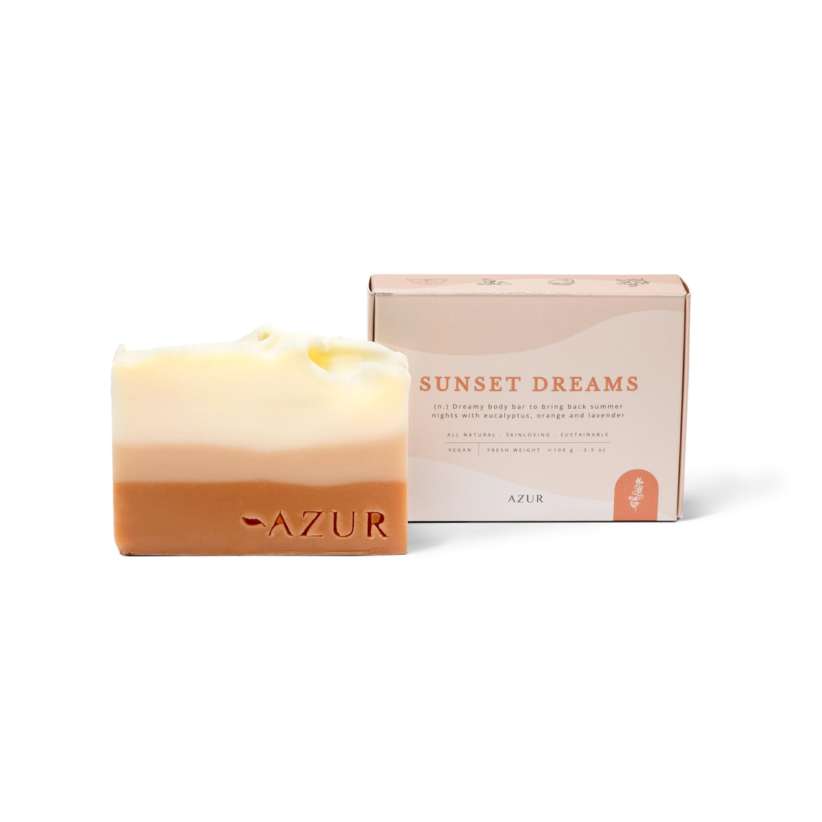 De Azur Sunset Dreams Natuurlijke Zeep Bar, handgemaakt in Nederland, heeft een wit en perzik kleurverloop en elegant AZUR-embossement, gepresenteerd naast zijn minimalistische doos van Azur.