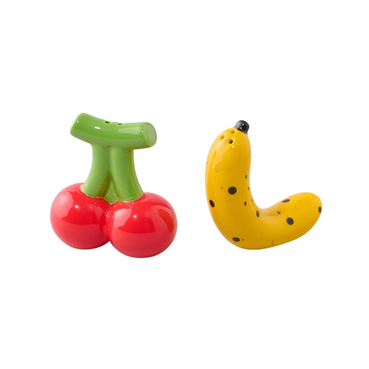 Fluid Market Zout- en Pepervaatjes Banaan Kers 2 st. van Fluid Market hebben keramische zout- en pepervaatjes in de vorm van een gele banaan en rode kersen, die eigenzinnige tafelcharme toevoegen in de kenmerkende Fluid Market-stijl.