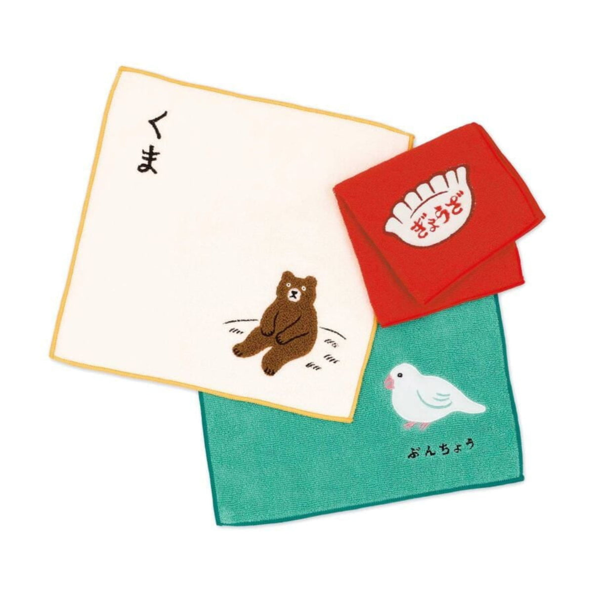 De Hightide New Retro Handdoek Ivoor 25/25 is een Japanse handdoek met een crèmekleurig, eenvoudig borduursel van een bruine beer met Japanse tekst - onderdeel van een collectie met rode en groene varianten van Hightide.