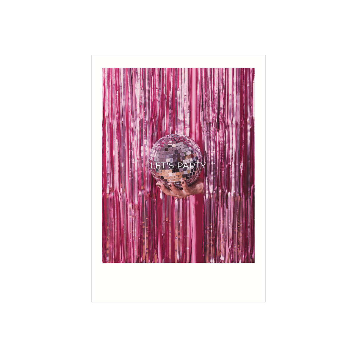 Een hand houdt een kleine discobal vast voor glanzende roze slingers met "LET'S PARTY" - de Matriks Postkaart Polaroid Let's Party Dubbel A6, een sprankelende Matriks kaart die elk feest opfleurt.