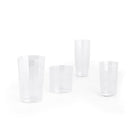 Vier transparante, gefacetteerde plastic bekers uit de Hay Angle Waterglazen 4 st. set van Hay zijn gerangschikt op een wit oppervlak, waardoor een elegante look ontstaat met veel lege ruimte eromheen.