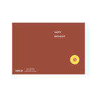 Een bordeauxrode wenskaart van Matriks met "HAPPY BIRTHDAY!" in het wit, een gele en roze cirkel rechtsonder en contactgegevens links - onderdeel van de Matriks JL Postkaart Happy Birthday Burgundy Dubbel collectie.