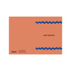 De Matriks JL Postkaart Happy Birthday Pink Dubbel van Matriks, ontworpen door Julie Lindekens, heeft blauwe golvende lijnen op een witte achtergrond met in het midden de tekst "HAPPY BIRTHDAY"; details en barcode staan linksonder.