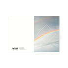 Op de Matriks Postkaart Lijn Happy B-Day Regenboog Dubbel A6 staat een regenboog in een bewolkte lucht met "HAPPY B-DAY" in een ruit. De linkerkant is blanco met barcode - ideaal voor fans van Antwerpse gebouwen. Merk: Matriks.