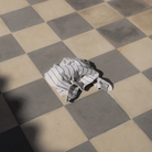 Een Bongusta Naram Badhanddoek Moonbeam & Ultramarine 70/140 met blauwe strepen ligt verfrommeld op een zwart-wit geblokte tegelvloer, verlicht door zonlicht.