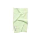 Het Bongusta Naram Gastendoekje Lemon Sorbet 30/50 is een lichtgroene rechthoekige handdoek met een klein zwart-wit "Bongusta" label in één hoek, weergegeven op een witte achtergrond met een lichte vouw.