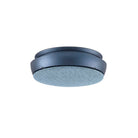 De Jacob Jensen Optical Rookmelder Blauw D10 heeft een modern rond ontwerp met een slanke zwarte behuizing en lichtgrijze gaasbodem, getoond vanuit een lage hoek tegen een witte achtergrond.