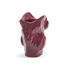 De Serax Marni After Midnight Uil Vaas Aubergine S heeft een glanzende, abstracte keramische vorm in diep aubergine met een gestructureerd, sculpturaal oppervlak, tegen een effen witte achtergrond.